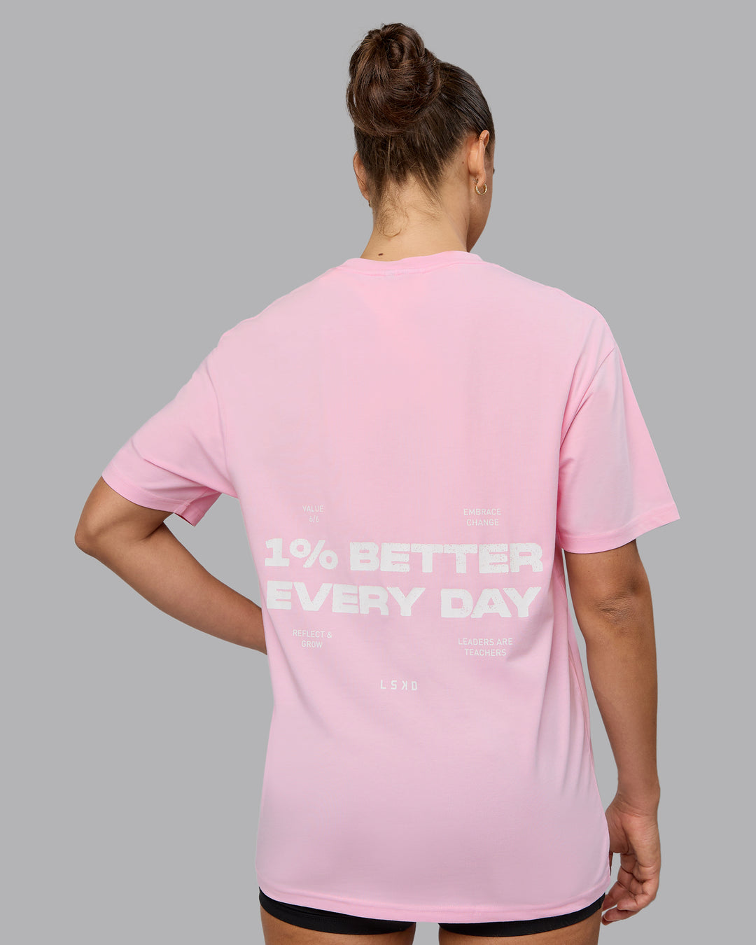 Woman wearing Unisex 1% Better Value Series FLXCotton Tee Oversize - Pale Pink-White