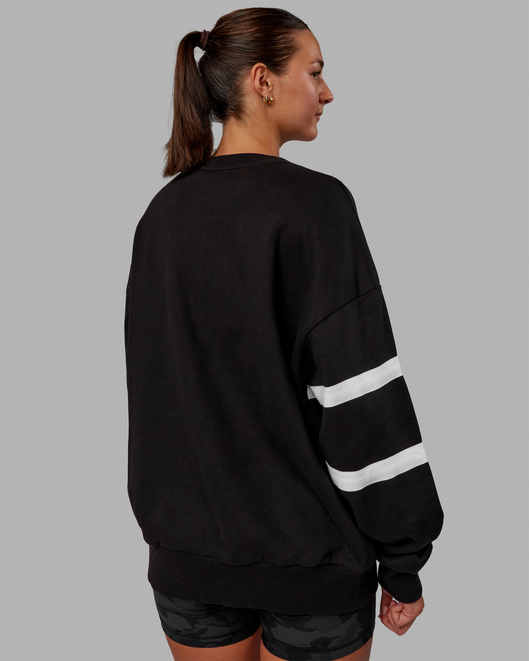 Woman wearing Unisex Collateral Sweater Oversize - Black-White