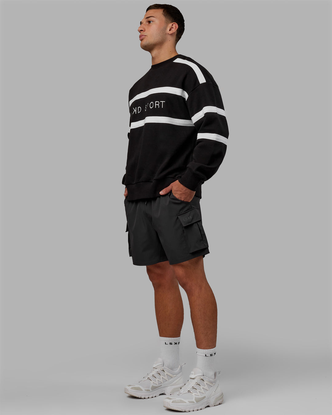 Man wearing Unisex Collateral Sweater Oversize - Black-White