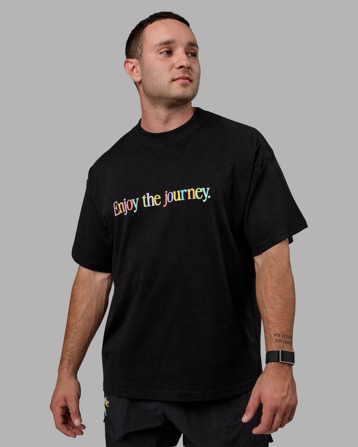 Man wearing Unisex Enjoy The Journey Heavyweight Tee Oversize - Black-Multi
