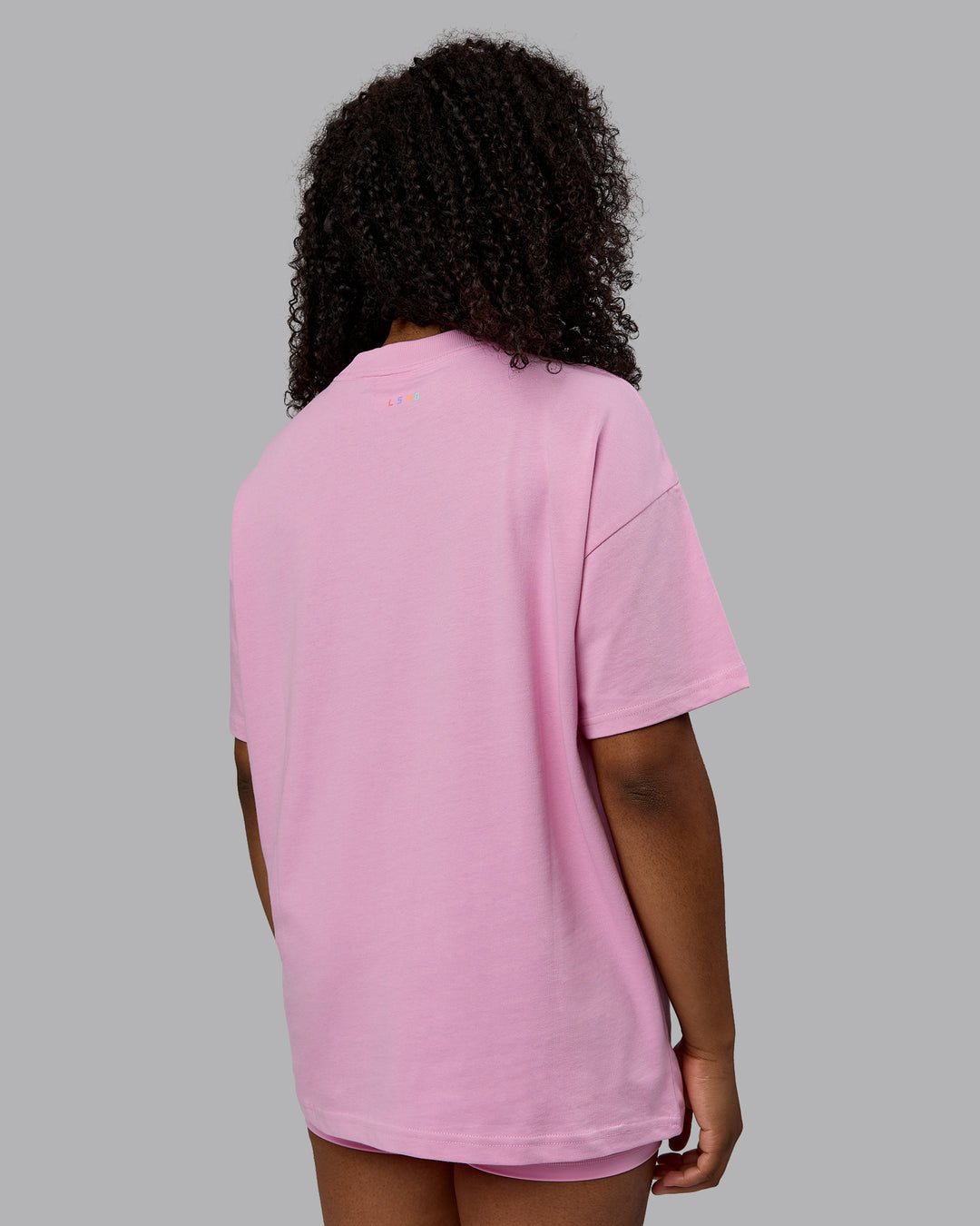 Woman wearing Unisex Enjoy The Journey Heavyweight Tee Oversize - Bubblegum-Multi