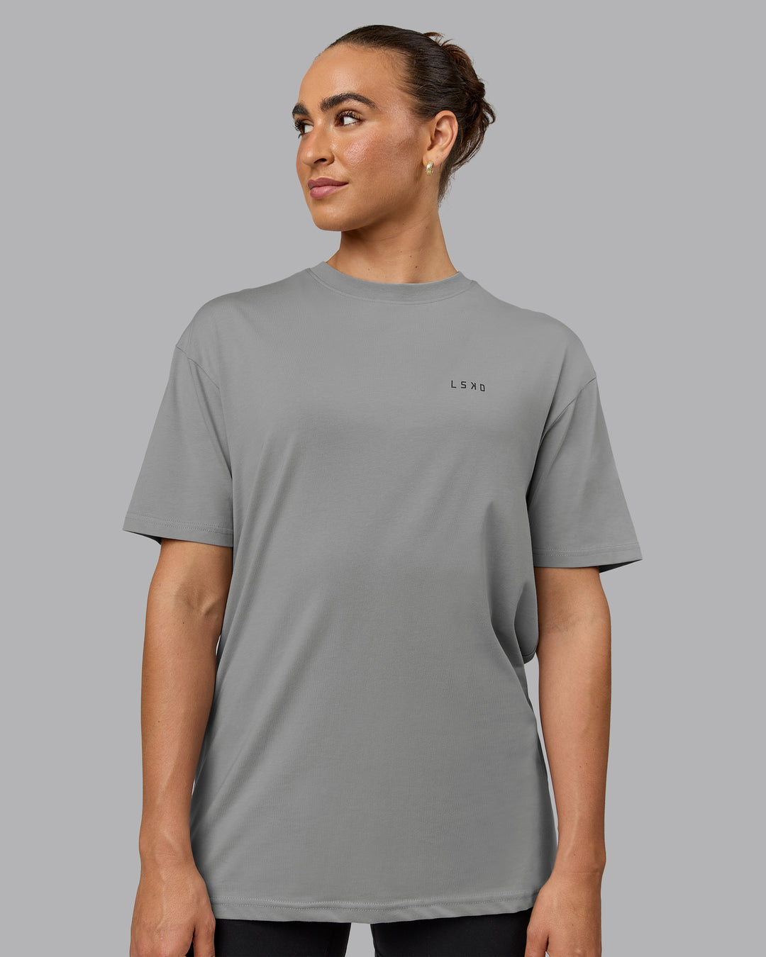 Woman wearing Unisex Enjoy the Journey Value Series FLXCotton Tee Oversize - Circular Grey-Pirate Black