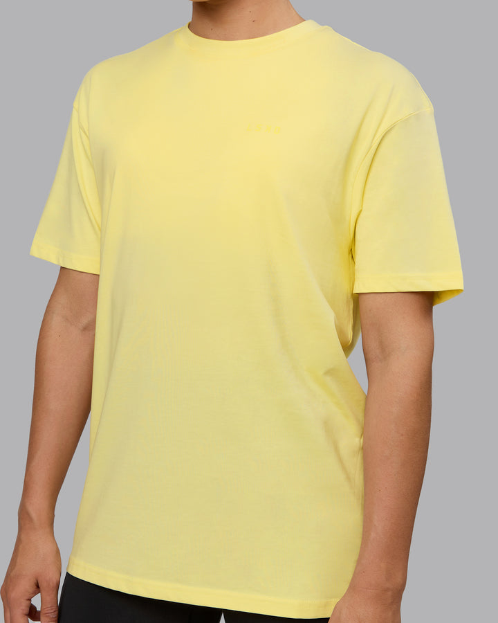 Woman wearing Unisex Enjoy the Journey Value Series FLXCotton Tee Oversize - Pale Yellow-Sundress
