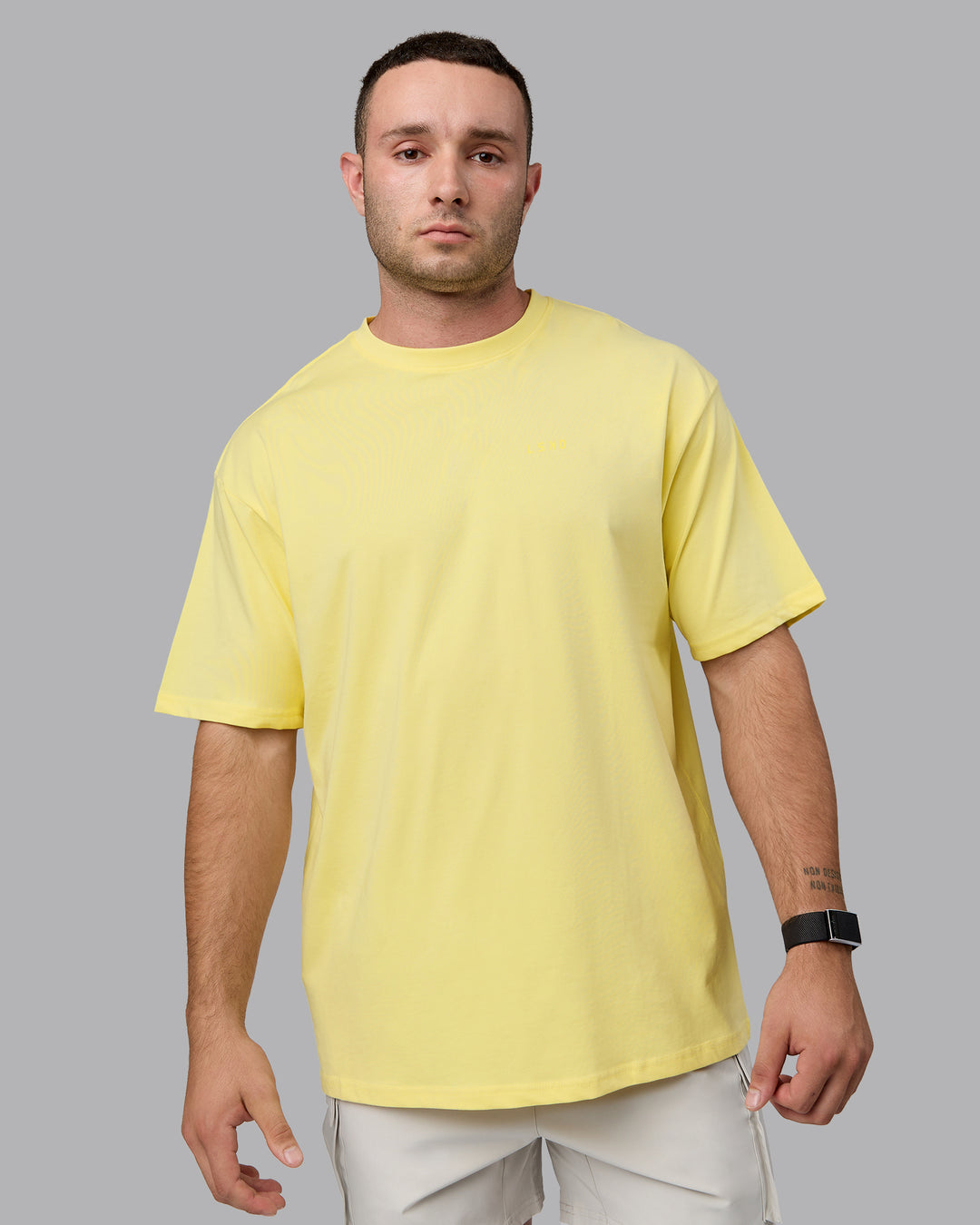 Man wearing Unisex Enjoy the Journey Value Series FLXCotton Tee Oversize - Pale Yellow-Sundress