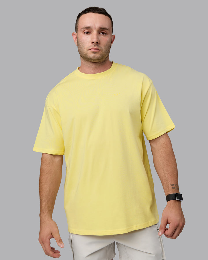 Man wearing Unisex Enjoy the Journey Value Series FLXCotton Tee Oversize - Pale Yellow-Sundress
