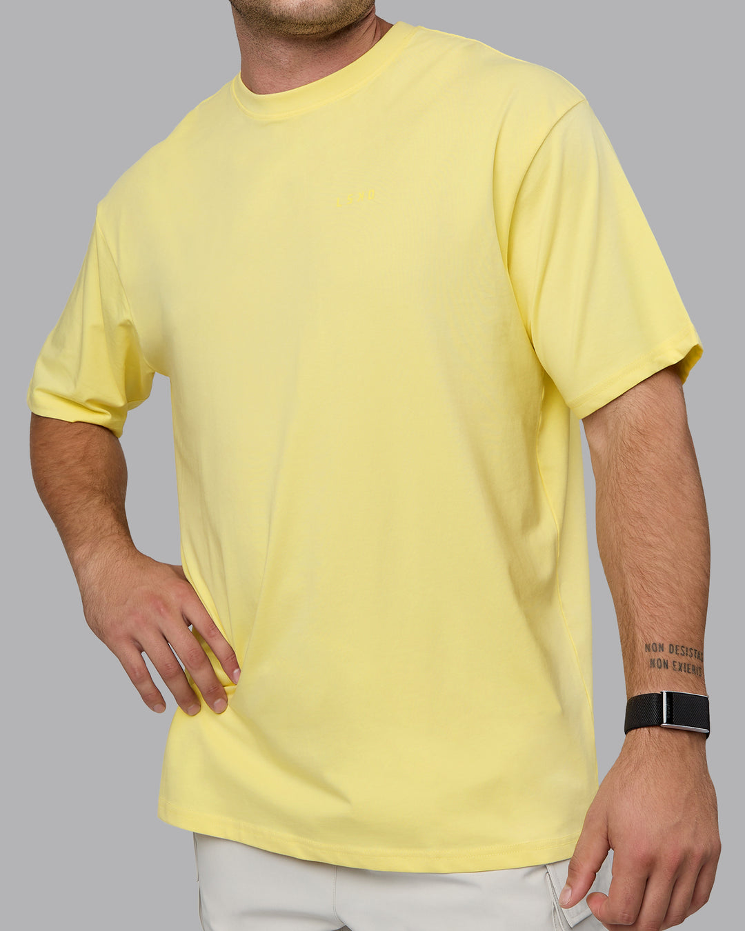 Man wearing Unisex Enjoy the Journey Value Series FLXCotton Tee Oversize - Pale Yellow-Sundress