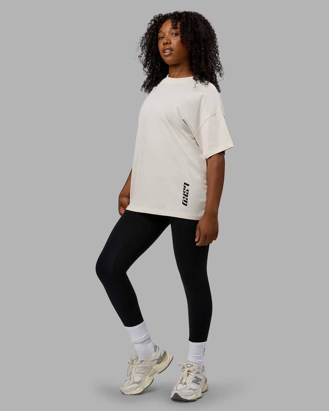 Woman wearing Unisex Fail Forward Heavyweight FLXCotton Tee Oversize - Off White-Black