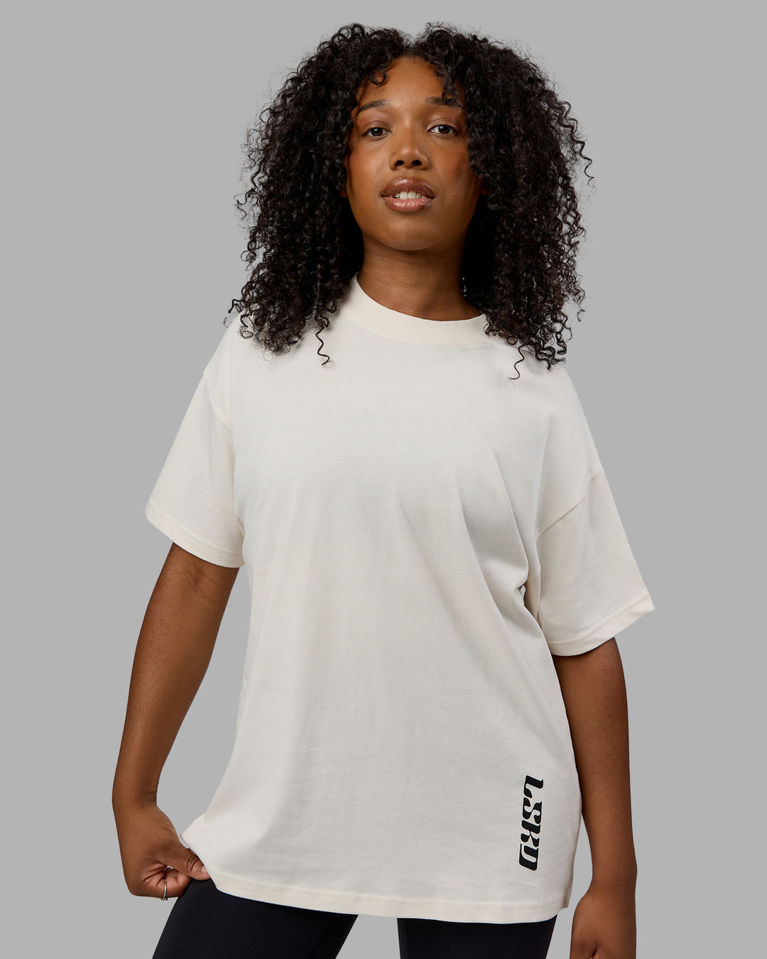 Woman wearing Unisex Fail Forward Heavyweight FLXCotton Tee Oversize - Off White-Black