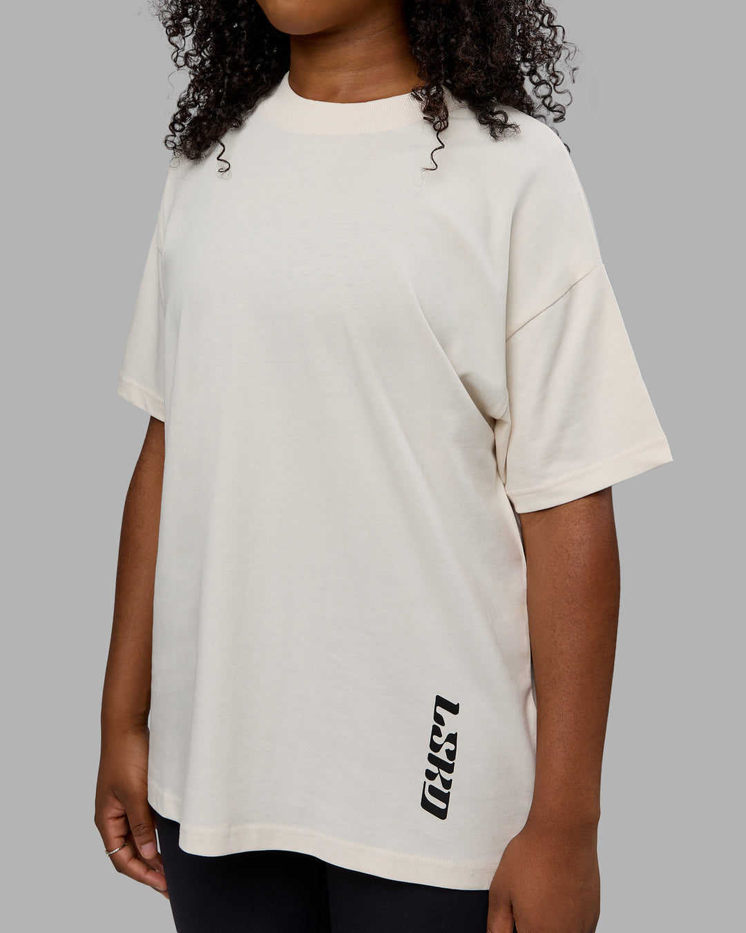 Woman wearing Unisex Fail Forward Heavyweight FLXCotton Tee Oversize - Off White-Black