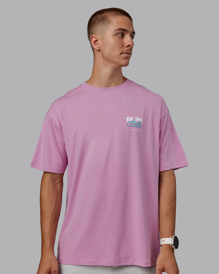 Man wearing Unisex Gone Running FLXCotton Tee Oversize - Bubblegum-Skyride
