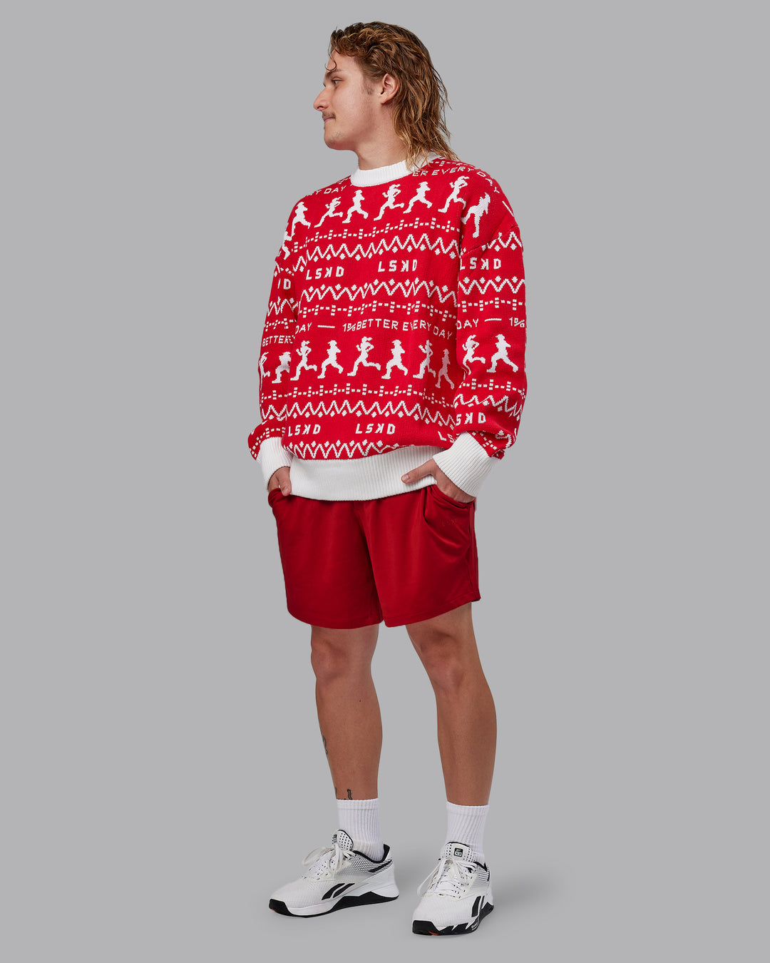 Man wearing Unisex LSKD Christmas Knit Sweater - Cherry Red-Ivory