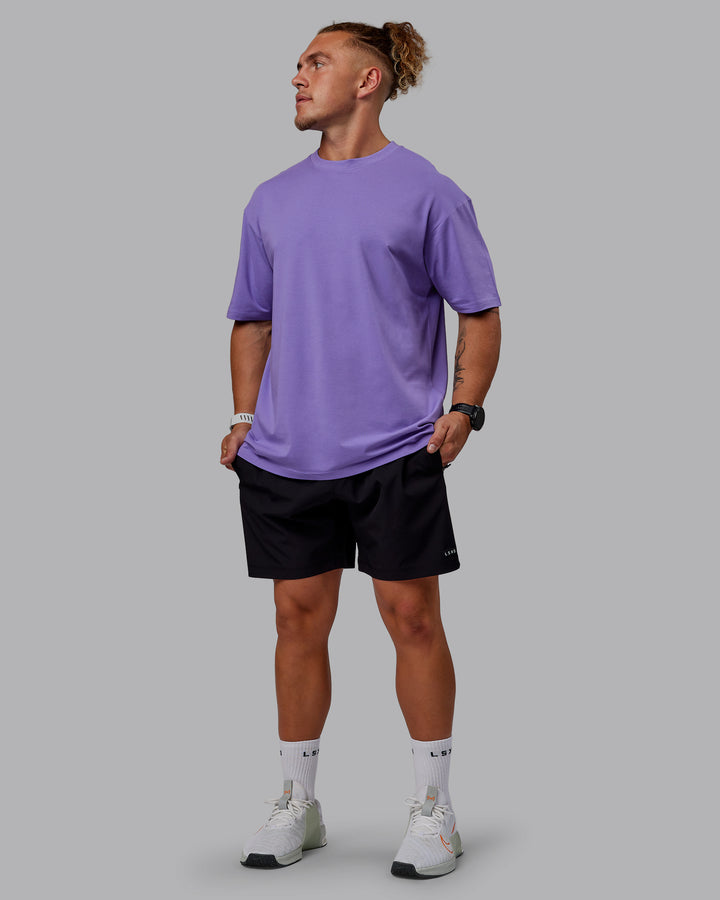 Man wearing Unisex Lifting Club FLXCotton Tee Oversize - Dahlia Purple-Black
