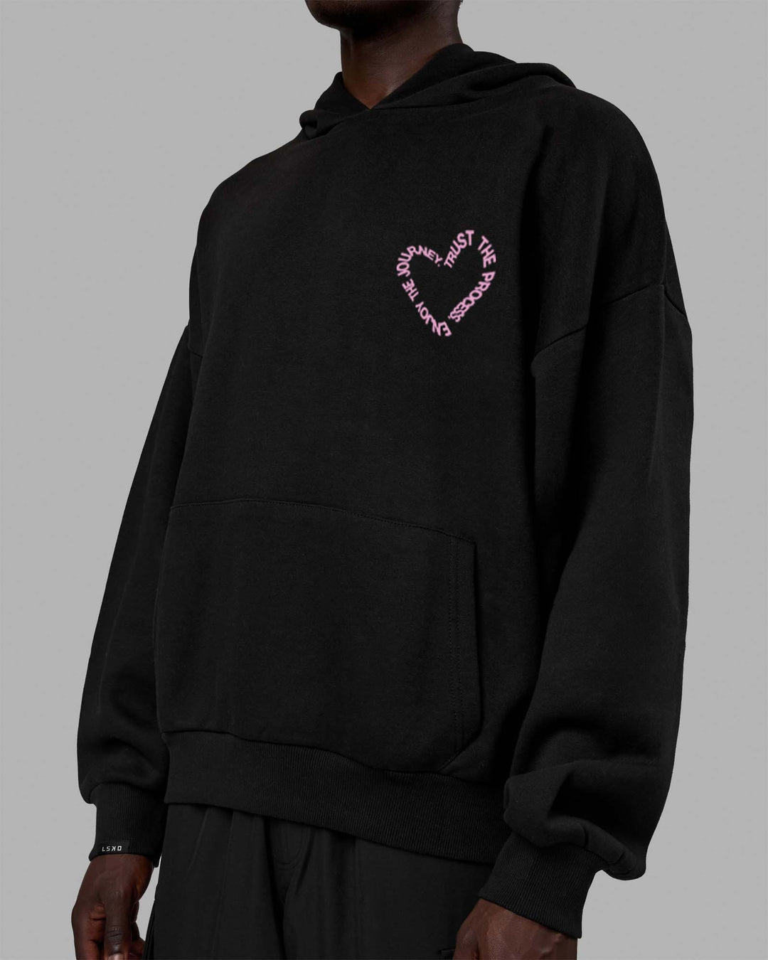 Man wearing Unisex Love The Process Oversize Hoodie - Black-Bubble Gum