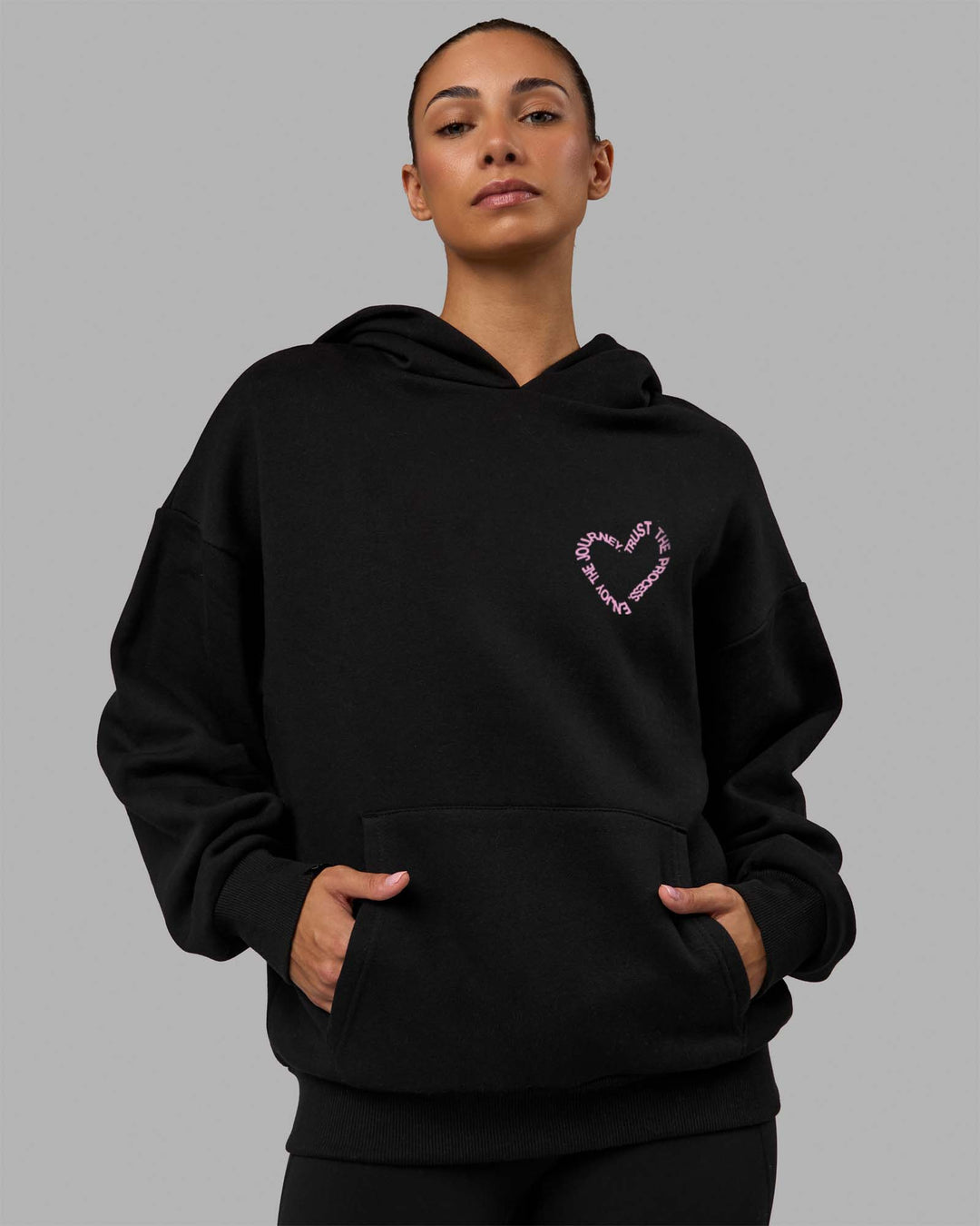 Woman wearing Unisex Love The Process Oversize Hoodie - Black-Bubble Gum