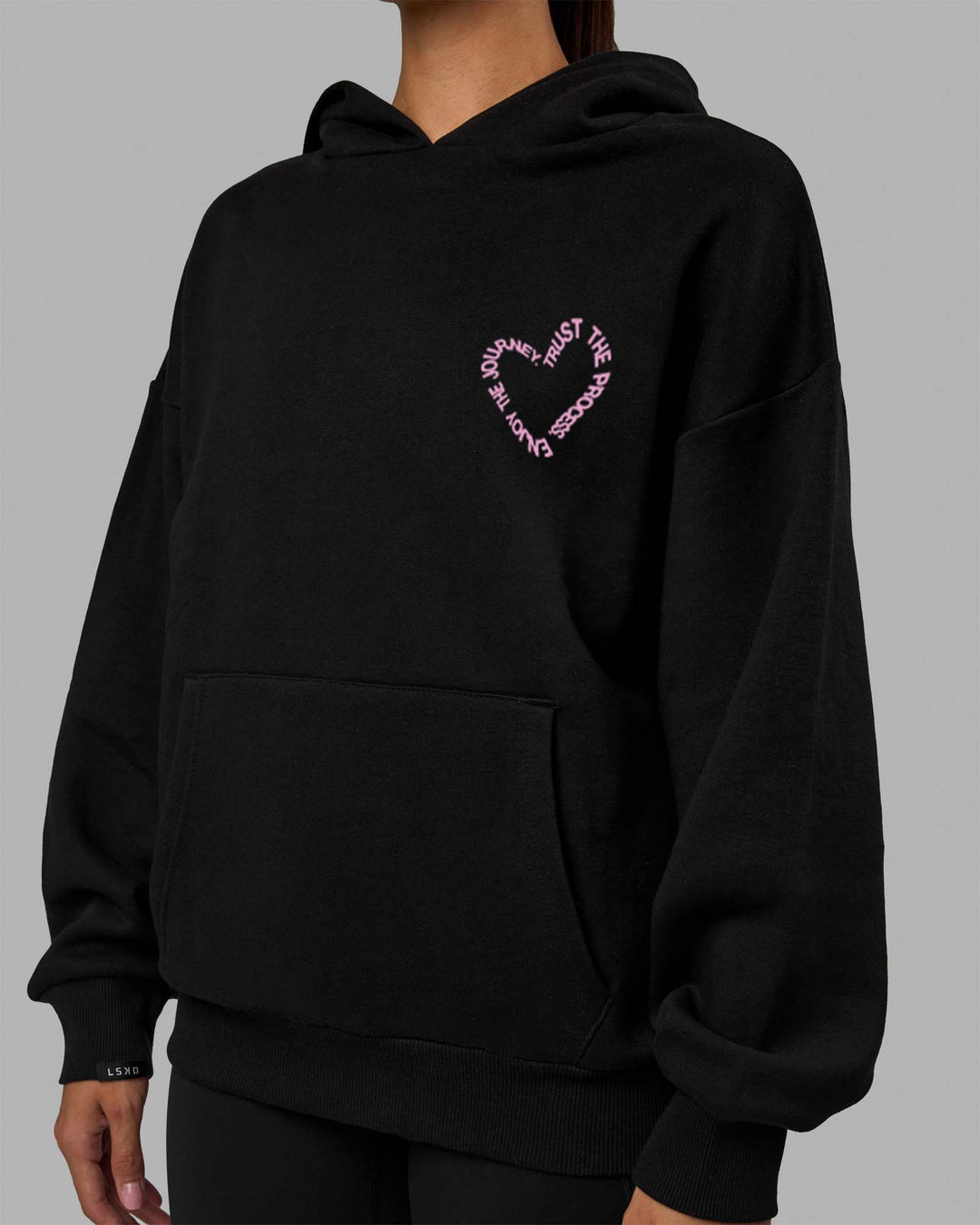 Woman wearing Unisex Love The Process Oversize Hoodie - Black-Bubble Gum