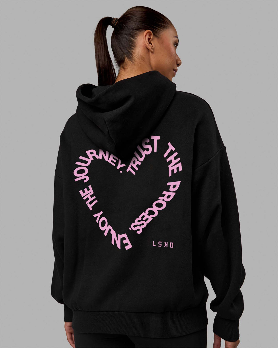 Woman wearing Unisex Love The Process Oversize Hoodie - Black-Bubble Gum