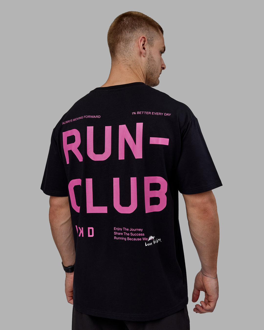 Man wearing Unisex Love The Run FLXCotton Tee Oversize - Black-Fuschia Pink