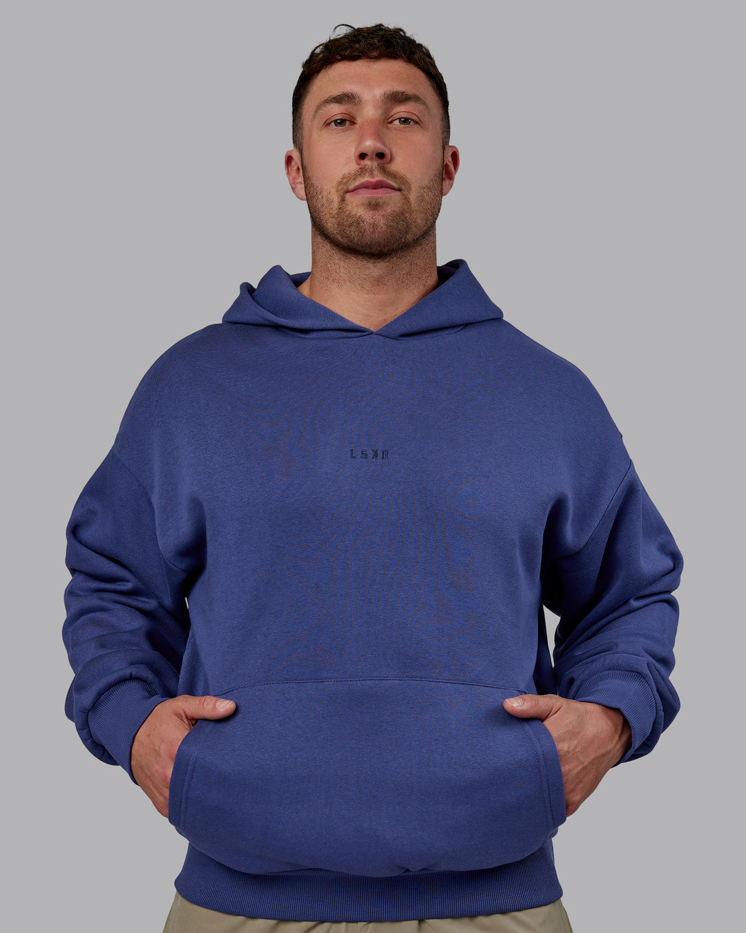 Man wearing Unisex MVP Hoodie Oversize - Future Dusk