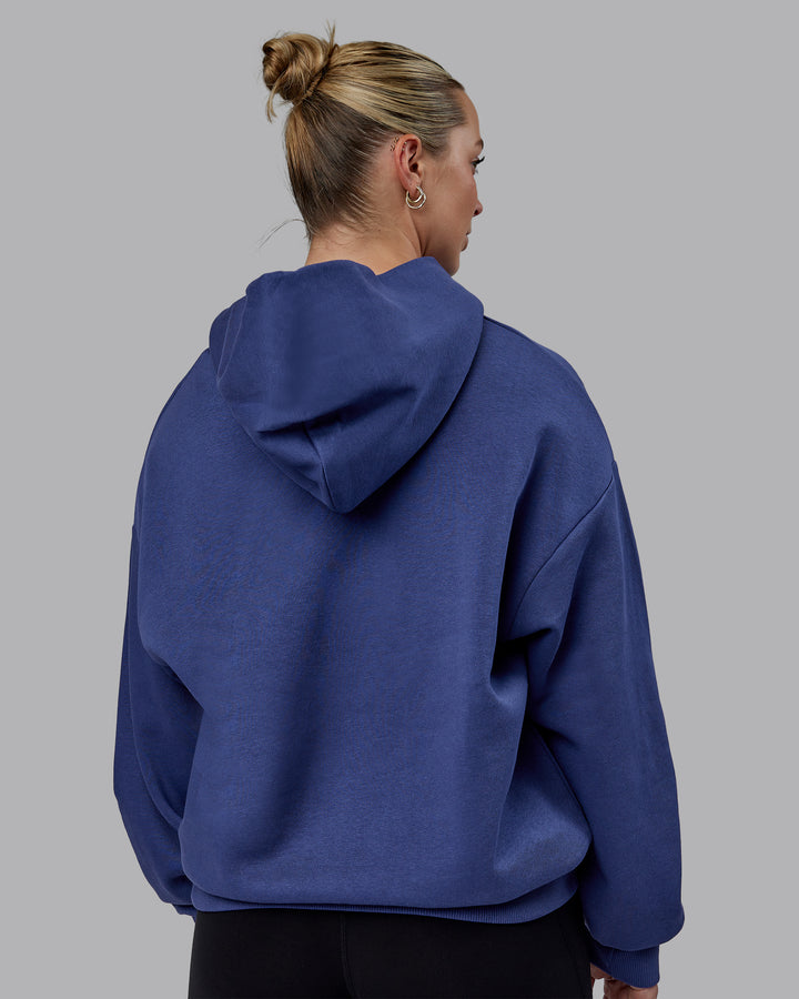 Woman wearing Unisex MVP Hoodie Oversize - Future Dusk
