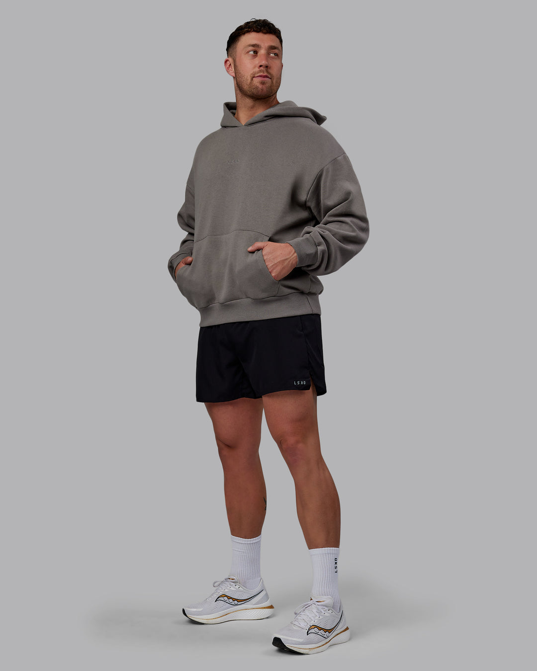 Man wearing Unisex MVP Hoodie Oversize - Storm Front