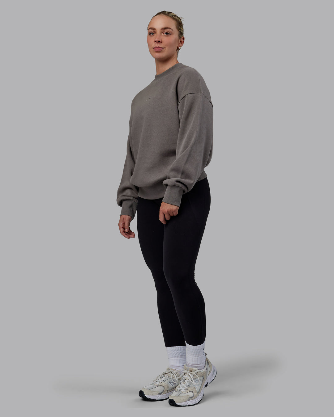 Woman wearing Unisex MVP Sweater Oversize - Storm Front