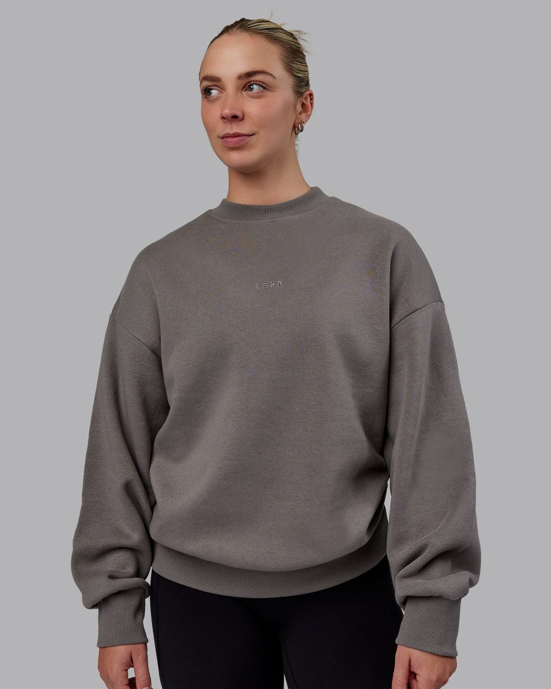 Woman wearing Unisex MVP Sweater Oversize - Storm Front