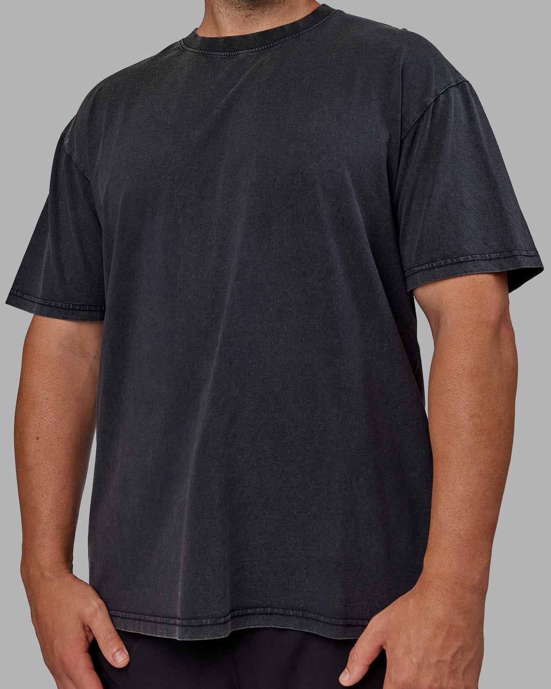 Man wearing Unisex Miami25 Washed FLXCotton Tee Oversize - Black-Amethyst