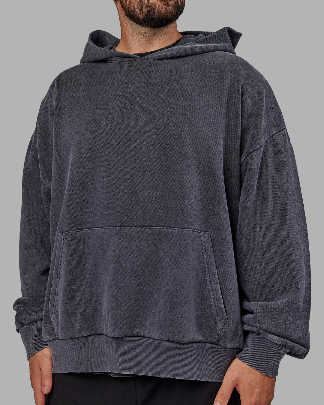 Man wearing Unisex Miami25 Washed Hoodie Oversize - Black