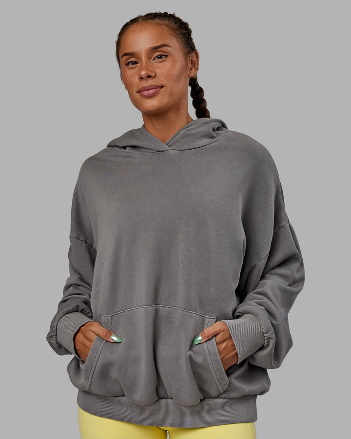 Woman wearing Unisex Miami25 Washed Hoodie Oversize - Storm Front
