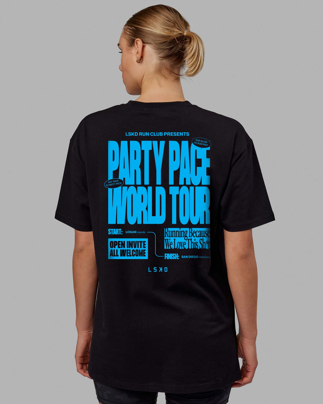 Woman wearing Unisex Party Pace FLXCotton Oversize Tee - Black-Blue  Edit alt text