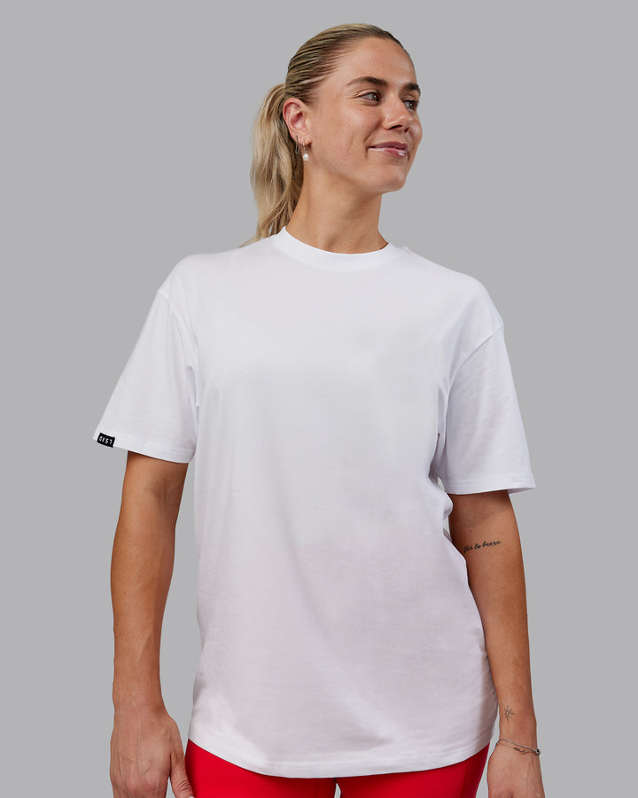 Woman wearing Peaches Pilates x LSKD FLXCotton Tee Oversize - White
