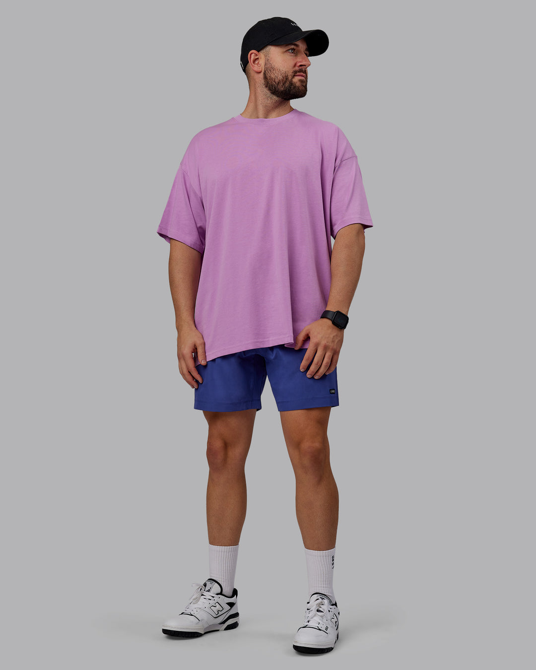 Man wearing Unisex Pressure Heavyweight Tee Oversize - Light Violet-White