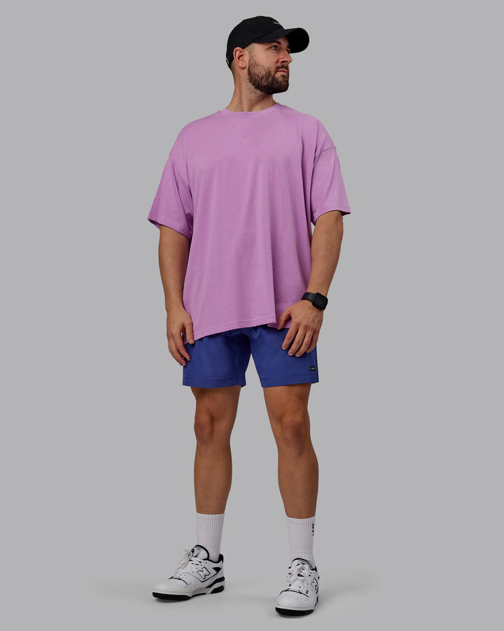 Man wearing Unisex Pressure Heavyweight Tee Oversize - Light Violet-White
