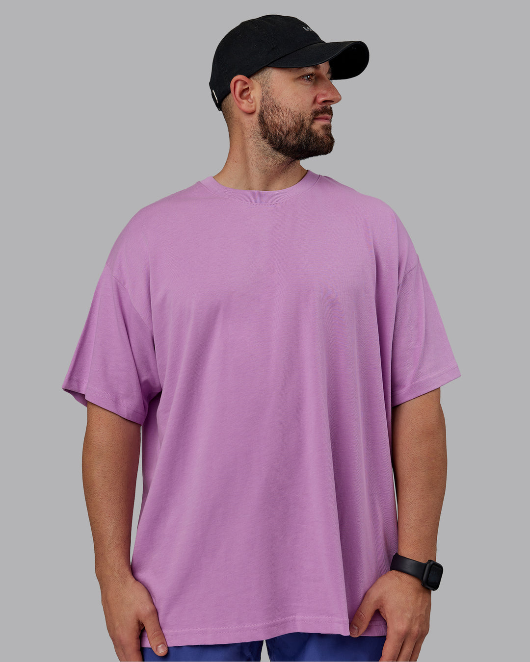 Man wearing Unisex Pressure Heavyweight Tee Oversize - Light Violet-White