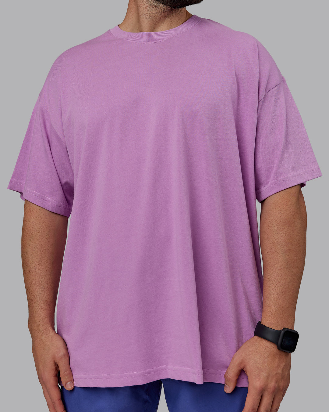 Man wearing Unisex Pressure Heavyweight Tee Oversize - Light Violet-White