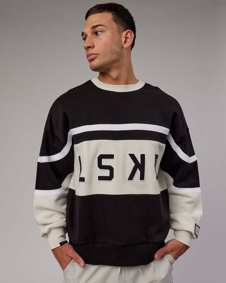 Man wearing Unisex PrimeTime Sweater Oversize - Black-Bone
