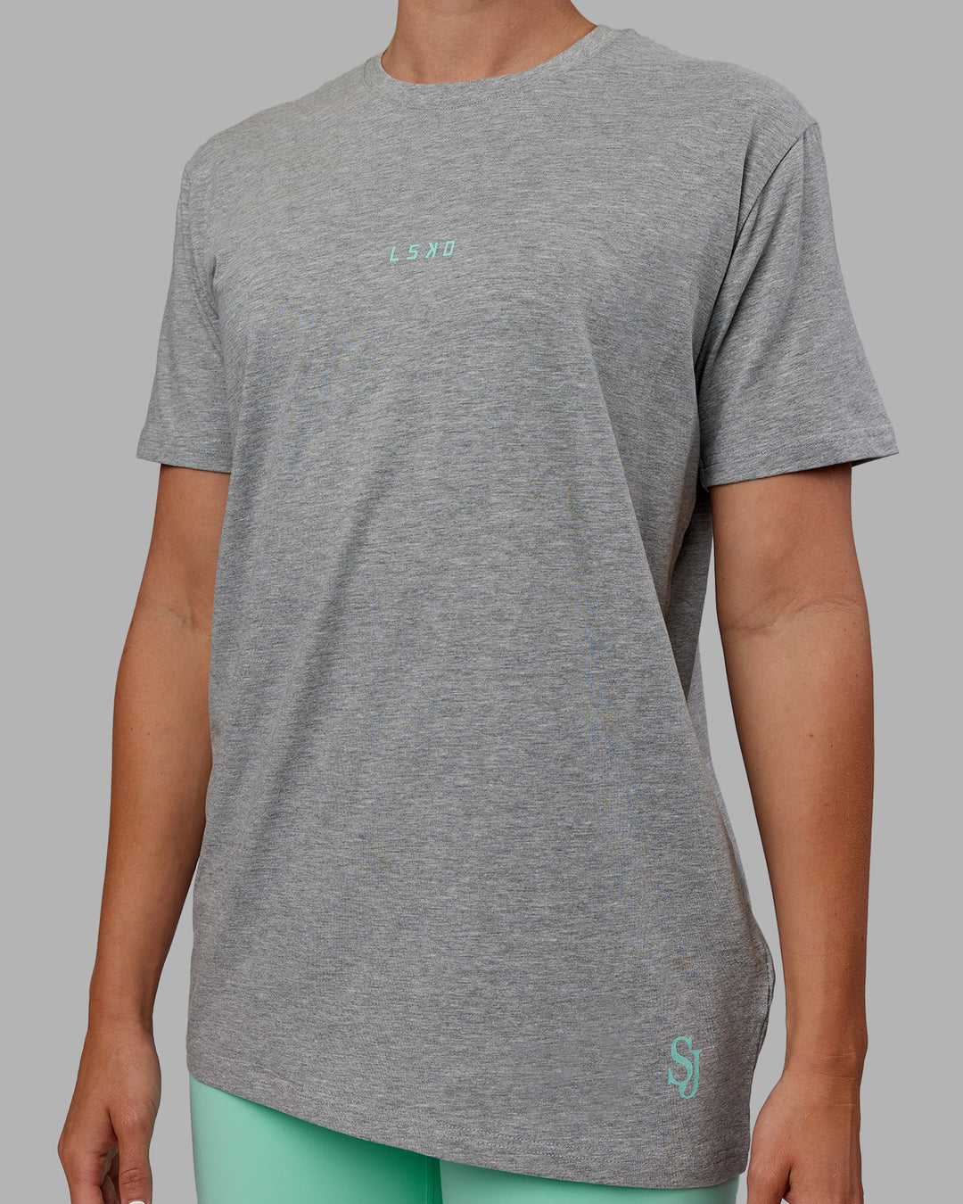 Woman wearing Unisex Resilient FLXCotton Tee - Light Grey Marl-Ice Green