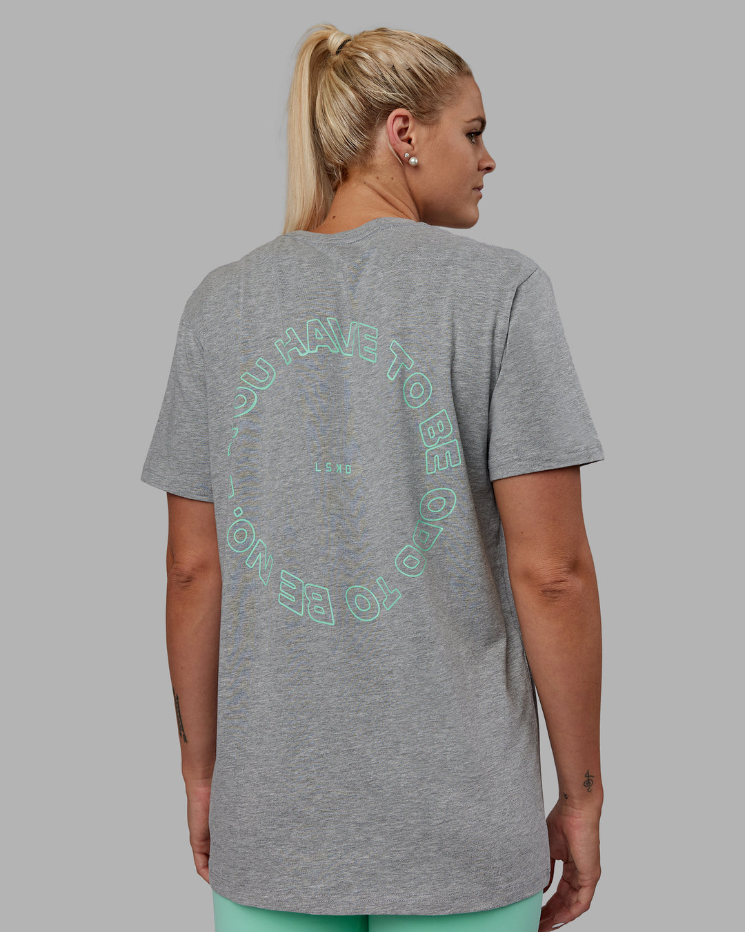 Woman wearing Unisex Resilient FLXCotton Tee - Light Grey Marl-Ice Green