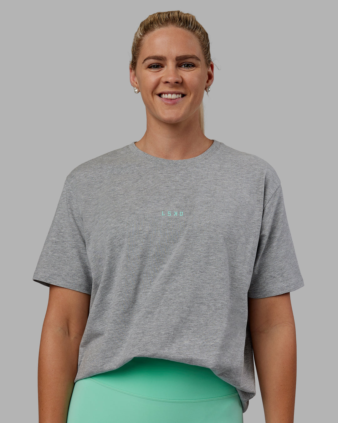 Woman wearing Unisex Resilient FLXCotton Tee - Light Grey Marl-Ice Green