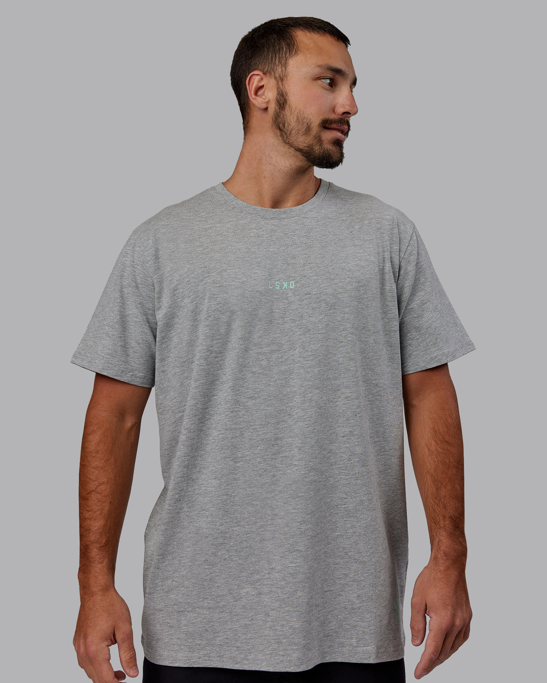 Man wearing Unisex Resilient FLXCotton Tee - Light Grey Marl-Ice Green