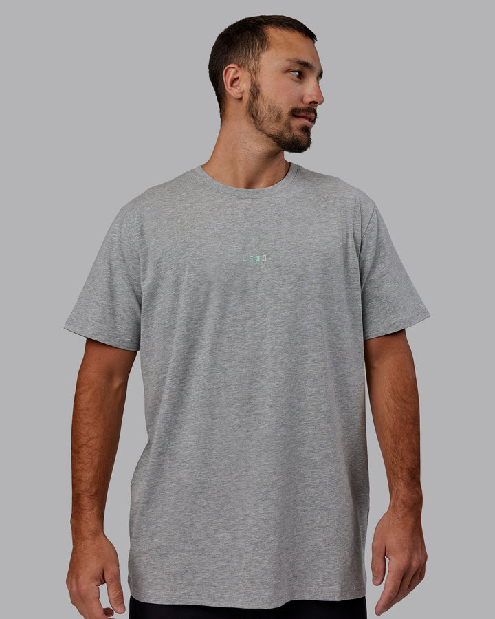 Man wearing Unisex Resilient FLXCotton Tee - Light Grey Marl-Ice Green
