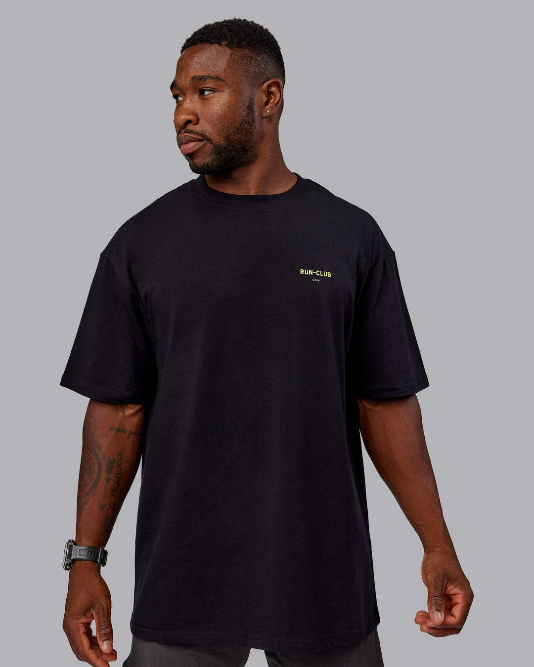 Man wearing Unisex RUN CLUB FLXCotton Tee Oversize - Black-Vol