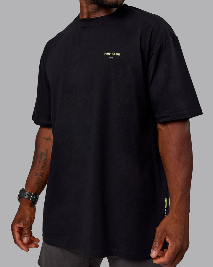 Man wearing Unisex RUN CLUB FLXCotton Tee Oversize - Black-Vol
