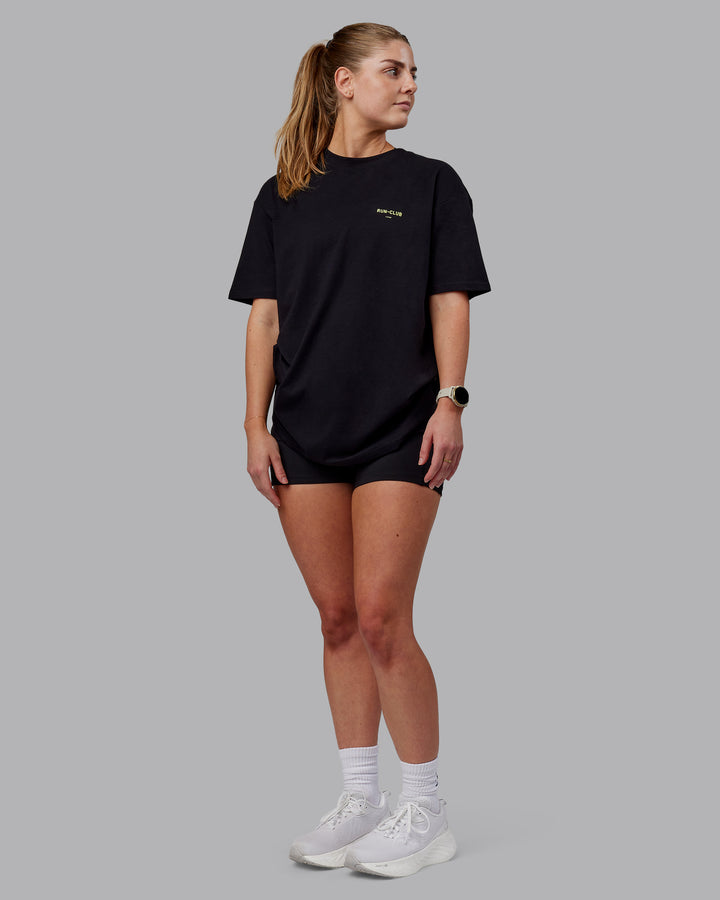 Woman wearing Unisex RUN CLUB FLXCotton Tee Oversize - Black-Vol
