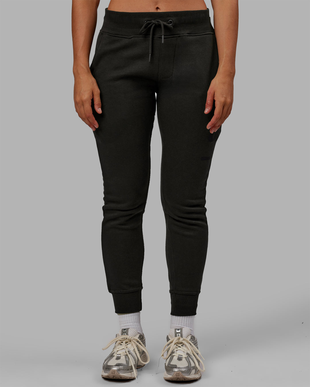 Woman wearing Unisex Structure Track Pants - Pirate Black-Black