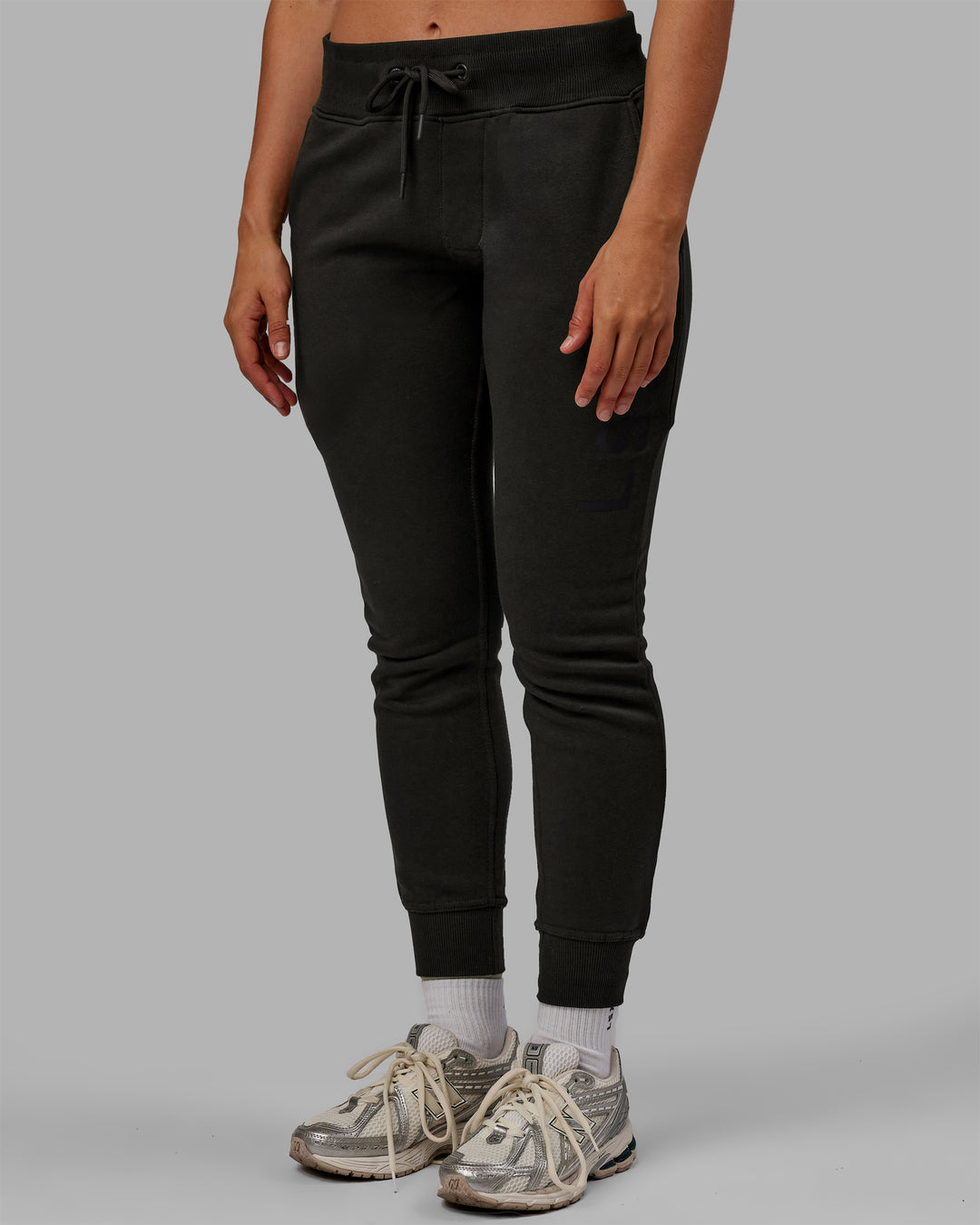 Woman wearing Unisex Structure Track Pants - Pirate Black-Black