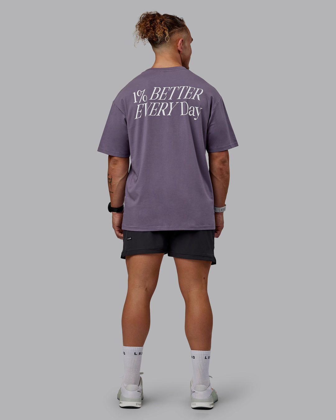 Man wearing Unisex VS6 FLXCotton Tee Oversize - Purple Sage-White