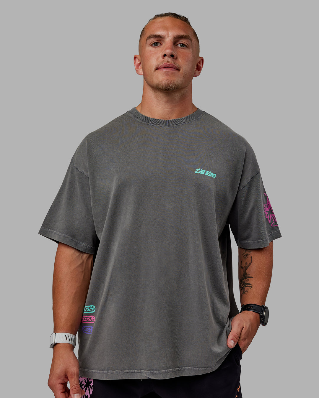 Man wearing Unisex Washed Huntington 24 Heavyweight Tee Oversize - Charcoal-Dahlia Purple