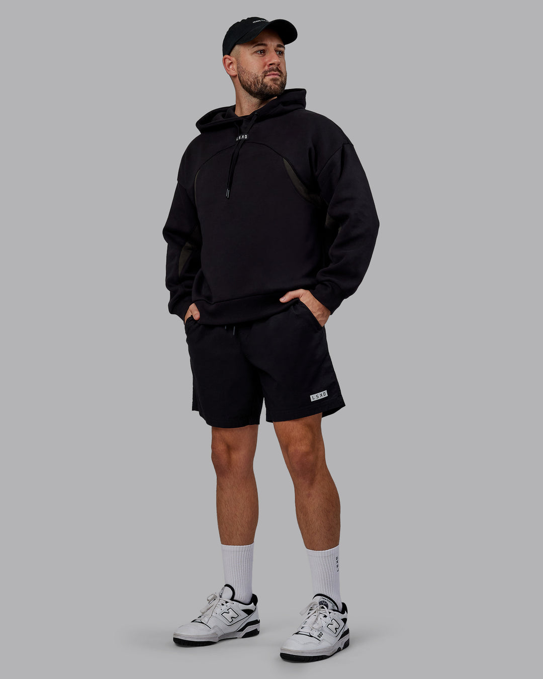 Man wearing Unisex Y2K Concept Panel Hoodie - Black-Pirate Black