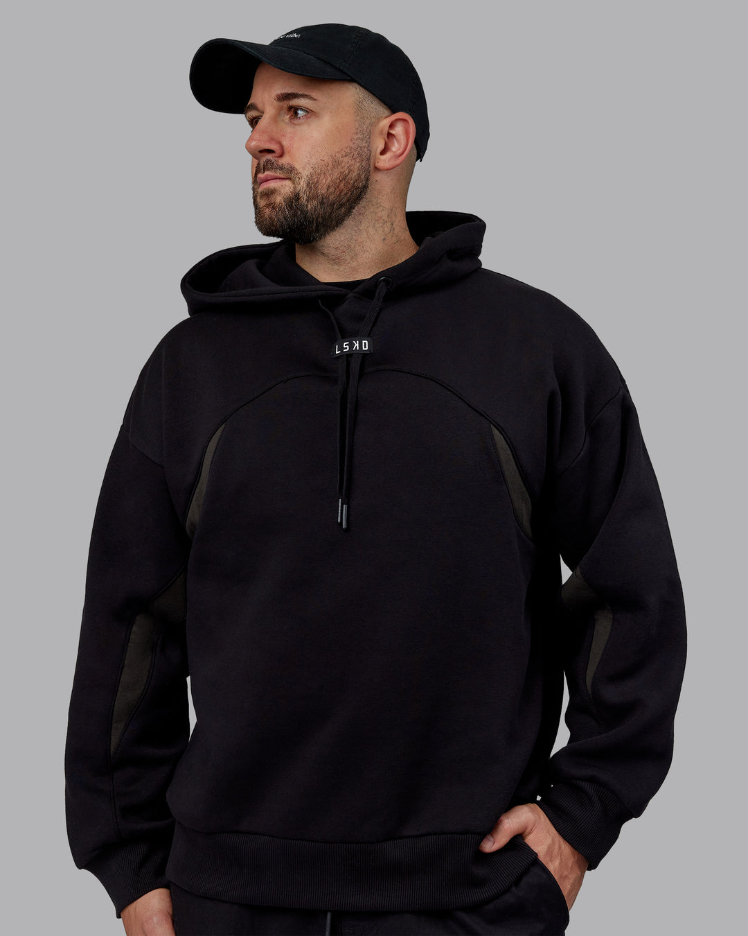 Man wearing Unisex Y2K Concept Panel Hoodie - Black-Pirate Black